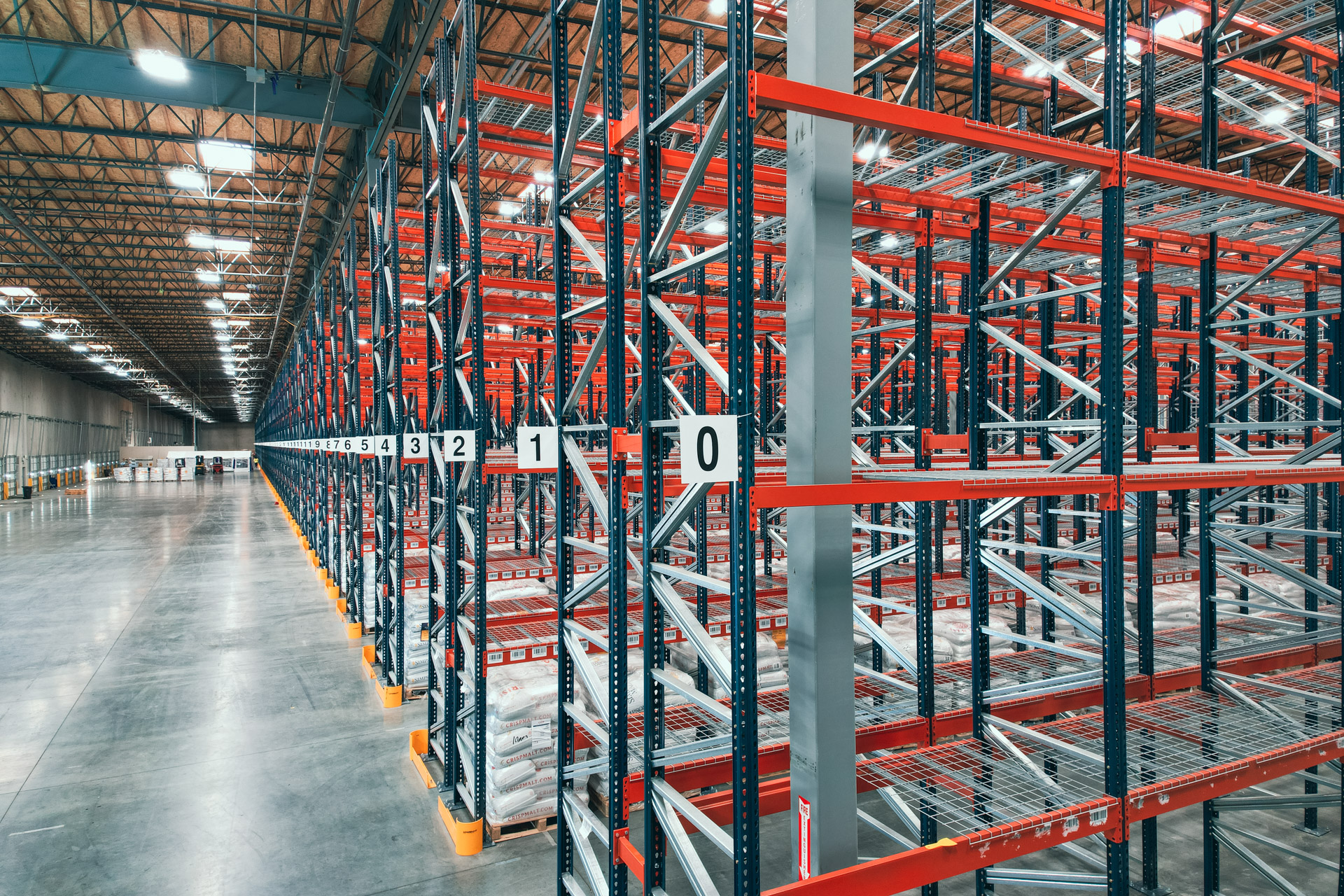 Pallet rack rows in a warehouse serving Dalton, GA