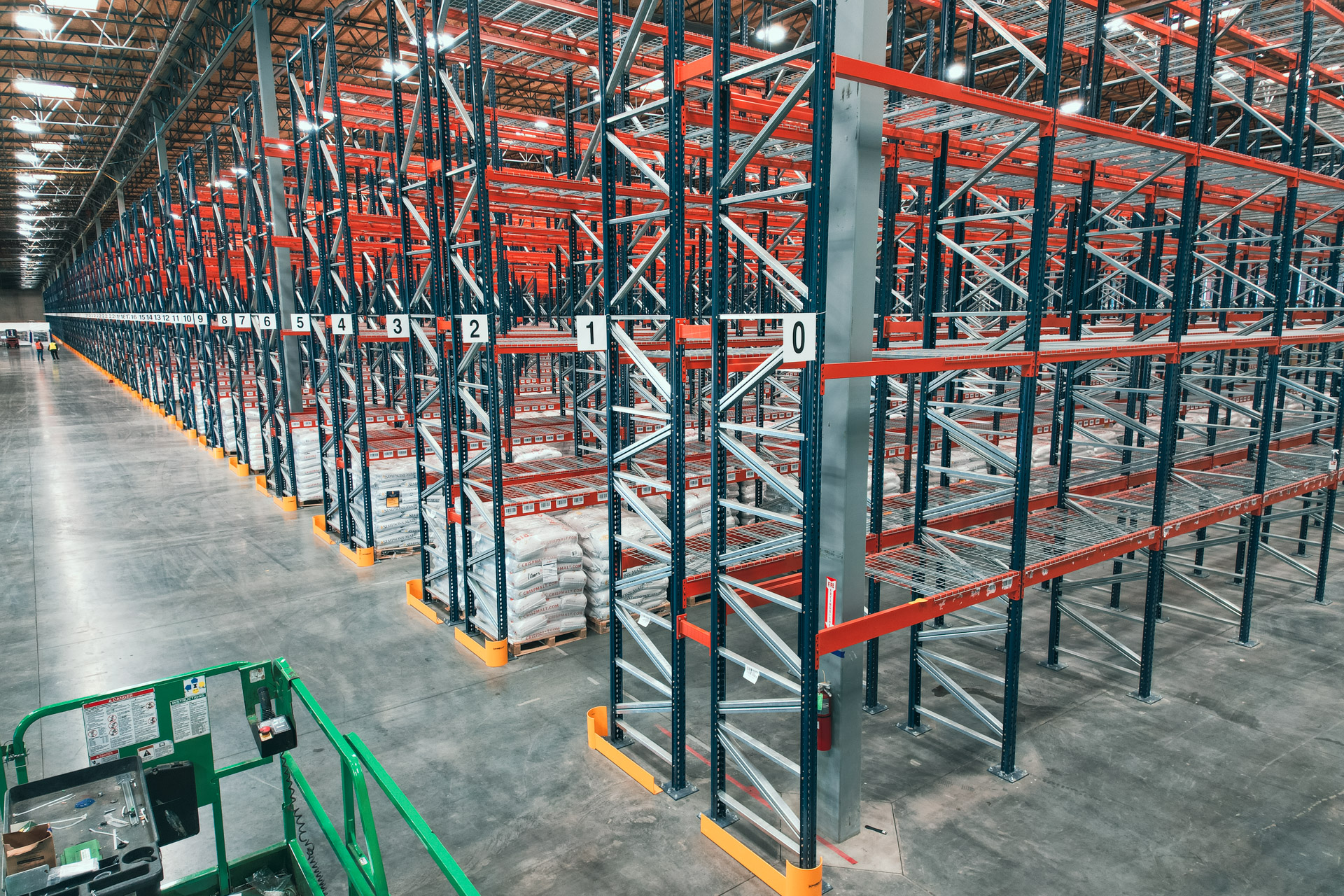 Wide view of a racked warehouse aisle